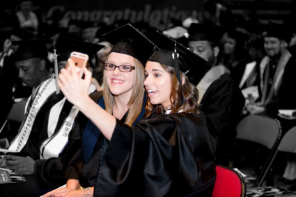 college students at commencement