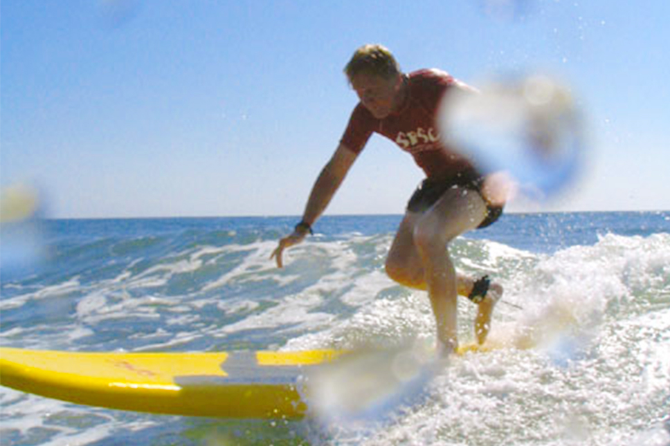Jackie Kyger surfing