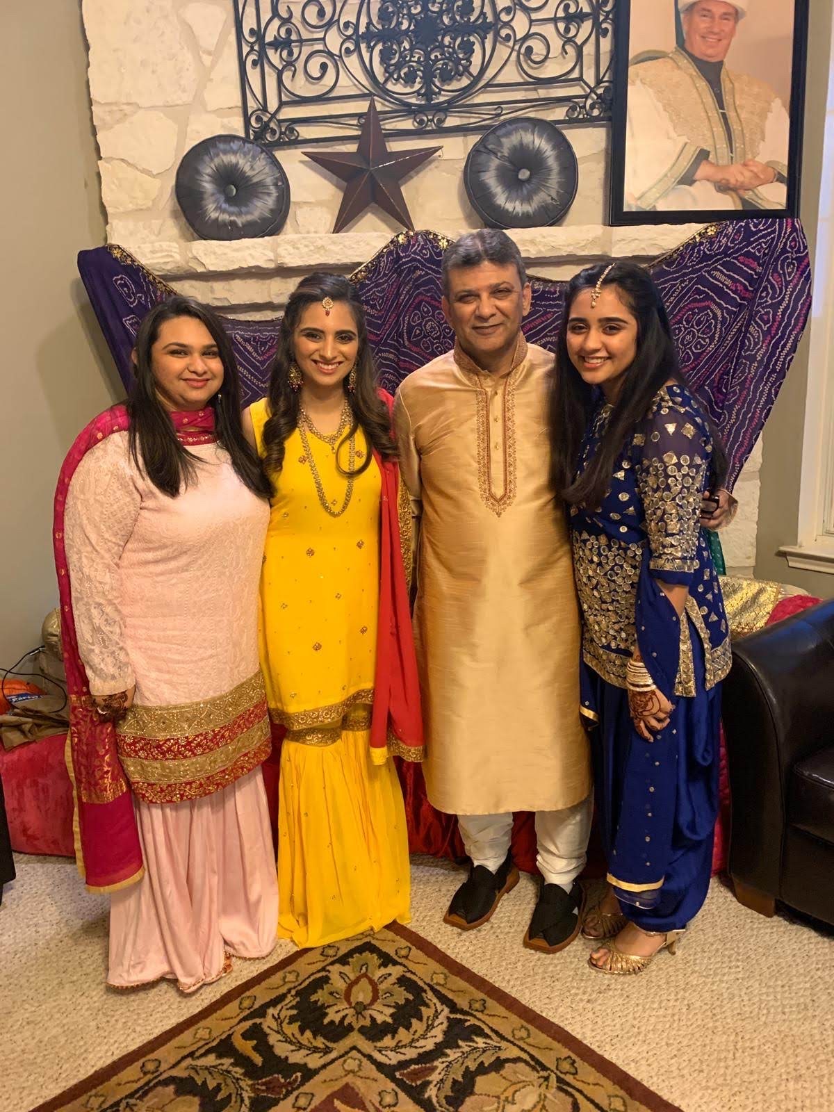 Farhina with her father and sisters.