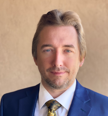 Headshot of Sam Passey