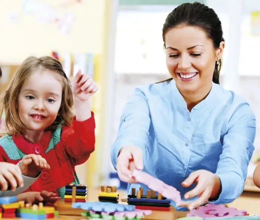 teacher with her young students