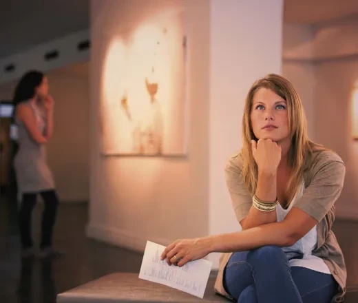 young woman in an art gallery