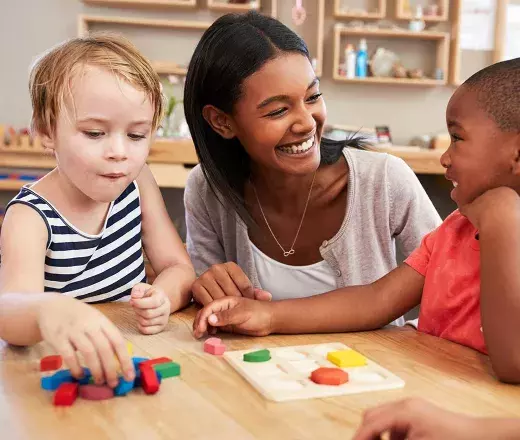 a young professional working with kids