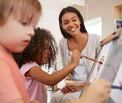 Lady working with children