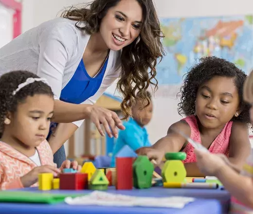 Lady working with children