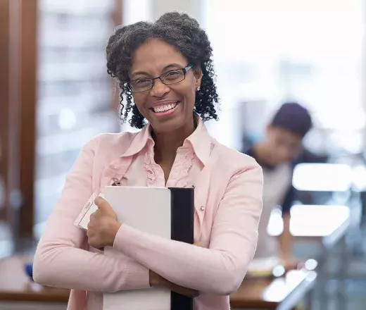 Lady smiling in the classroom