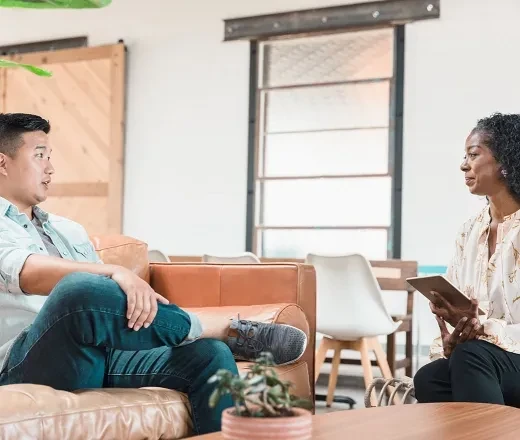 Psychologist talking to client