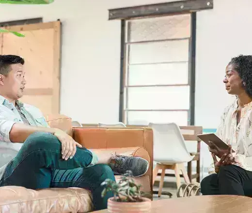 Psychologist talking to client