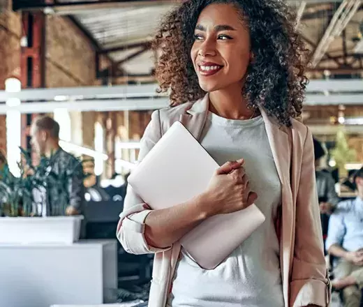 Woman walking through office