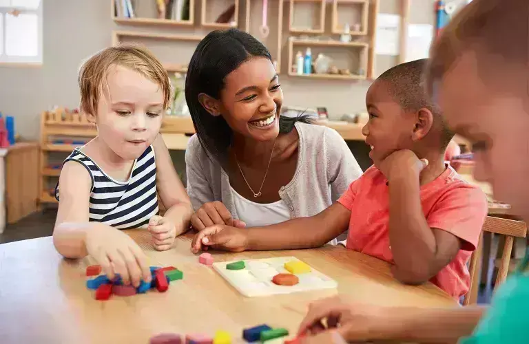 a young professional working with kids