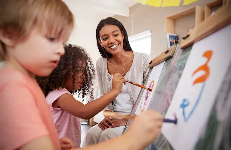 Lady working with children