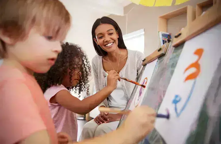 Lady working with children