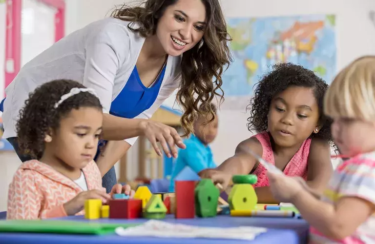 Lady working with children