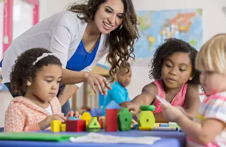 Lady working with children