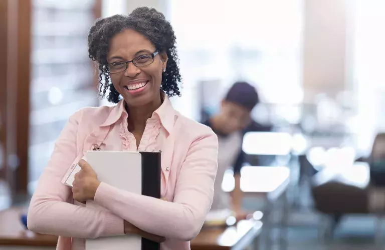 Lady smiling in the classroom