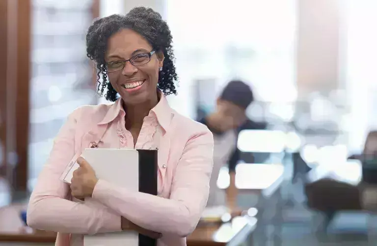 Lady smiling in the classroom