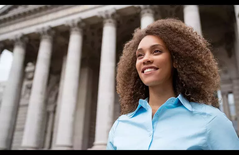 Lady outside courthouse