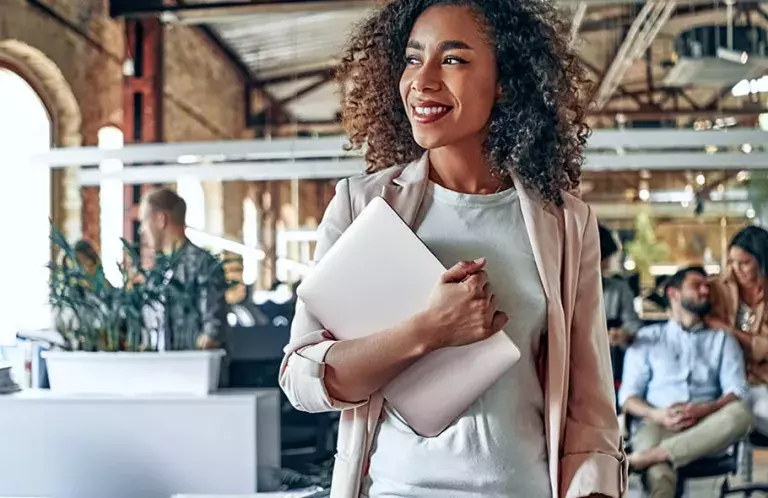 Woman walking through office