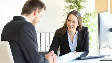 2 people in a meeting