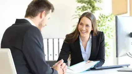 2 people in a meeting