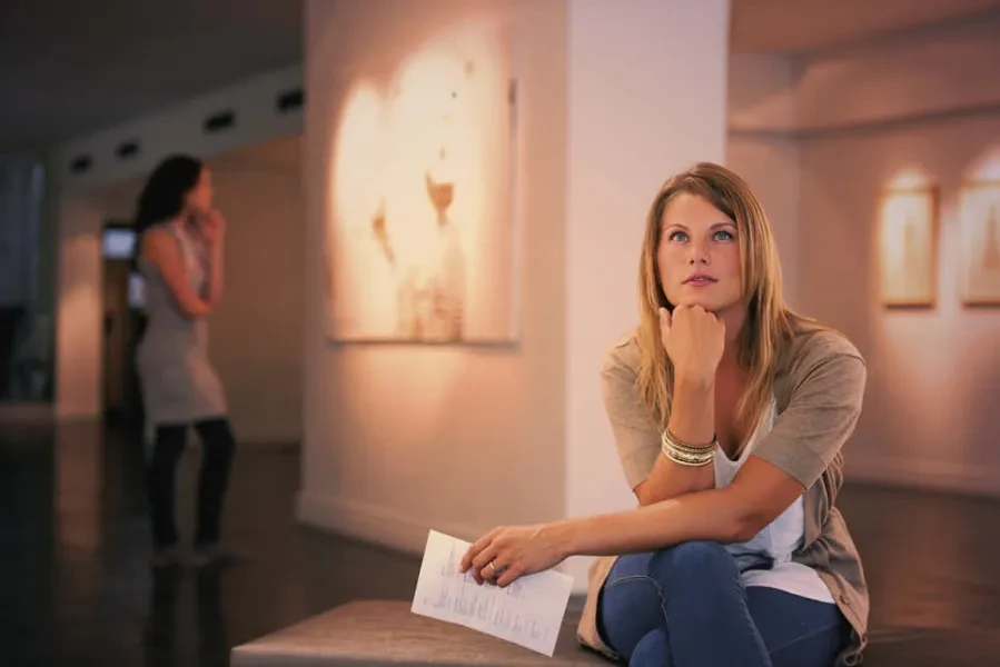 young woman in an art gallery