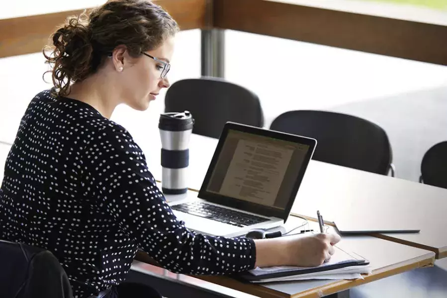 woman working on laptop