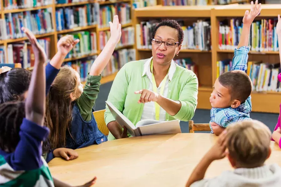 Teacher with students