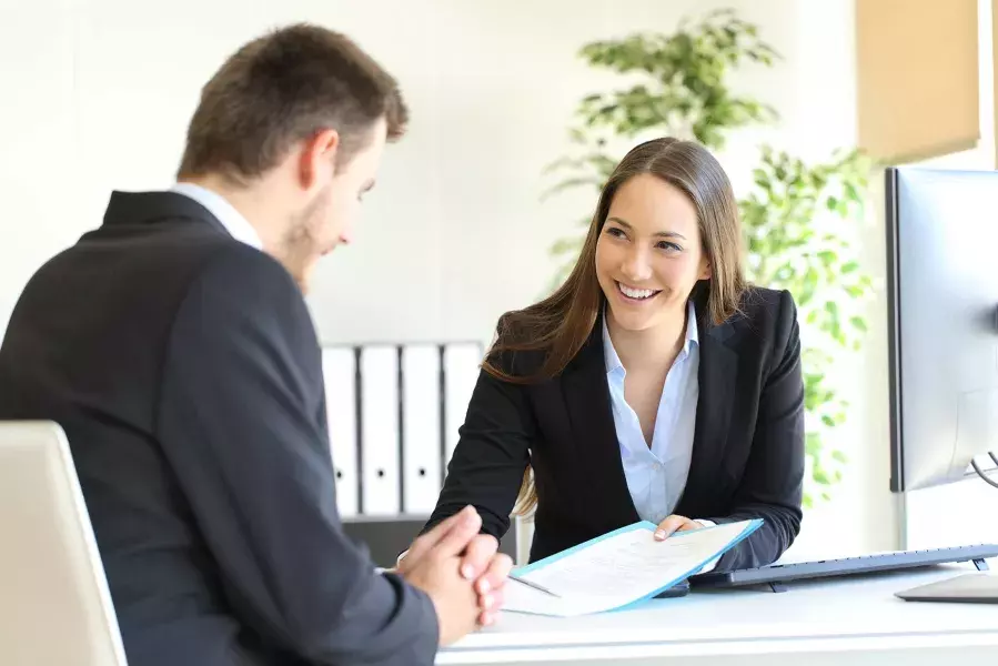 2 people in a meeting