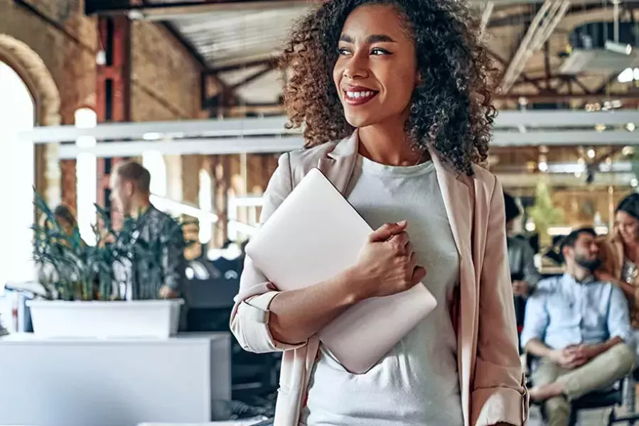 Woman walking through office