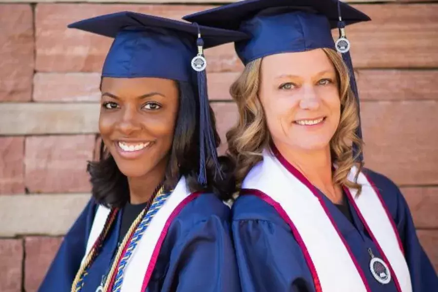 UAGC graduates posing