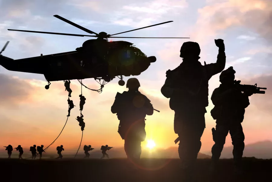 Soldiers and helicopter