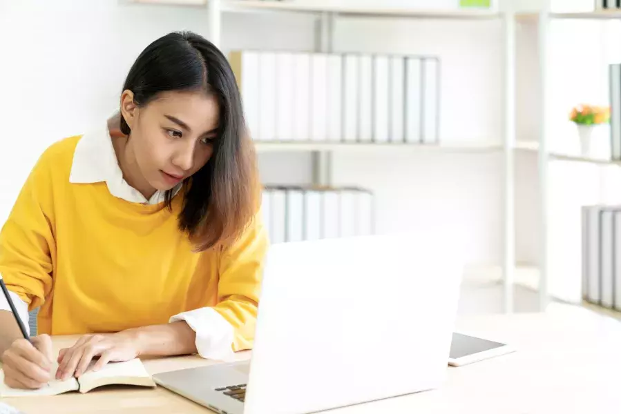 a student using her laptop