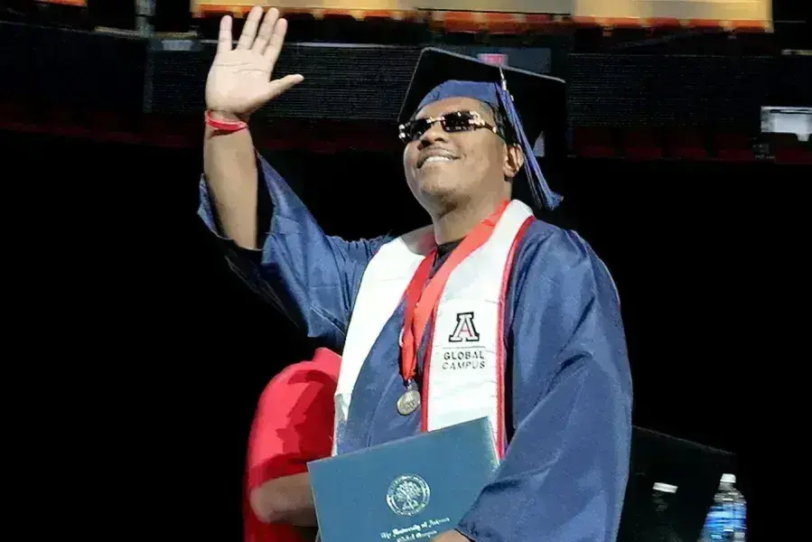 UGC graduate and comedian Emmanuel “Manny Griggs” Greer 