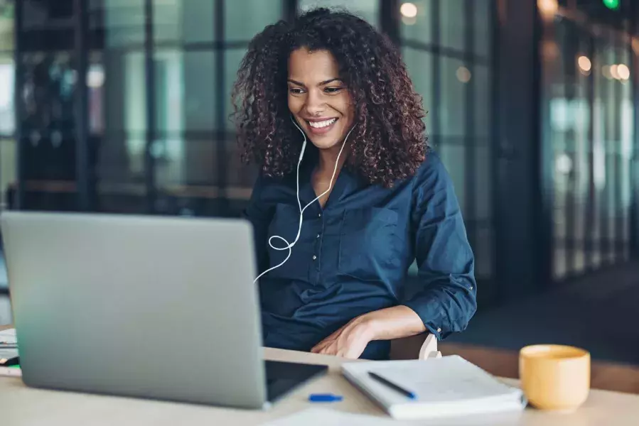 woman working using her laptop