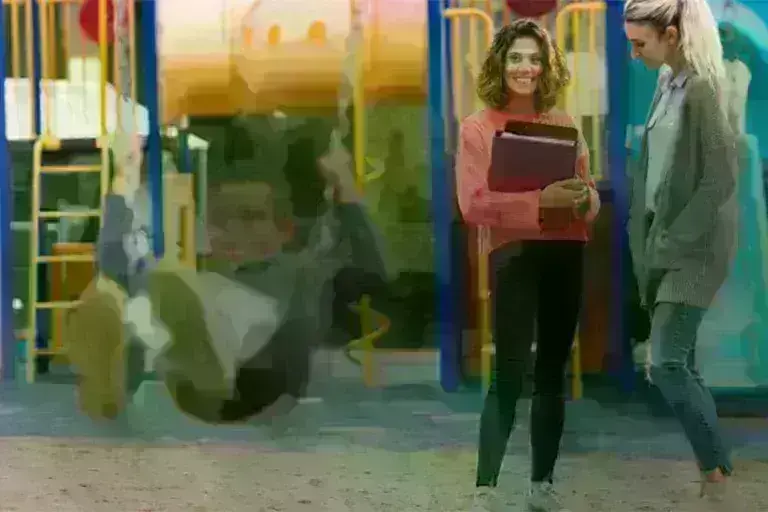 Teacher talking to parent