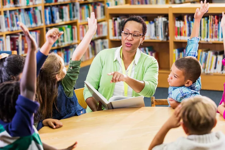 Teacher with students