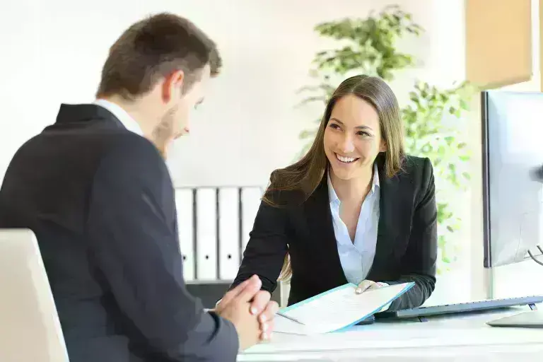 2 people in a meeting
