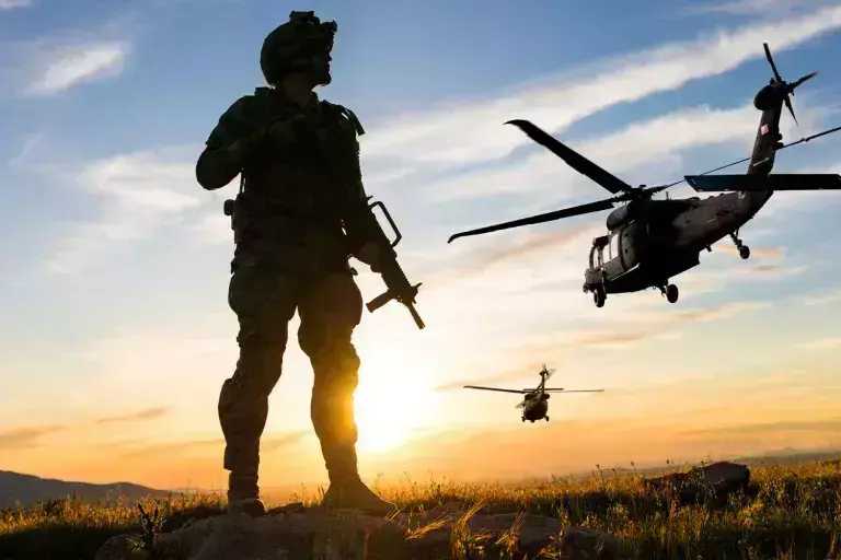 Soldier and helicopters