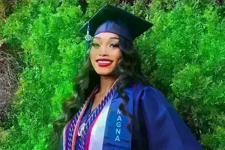 UAGC graduate posing