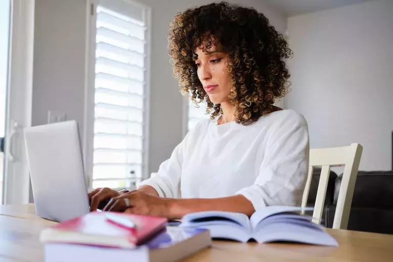 Woman working on arts and sciences