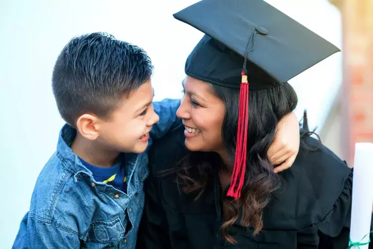 Graduate with son