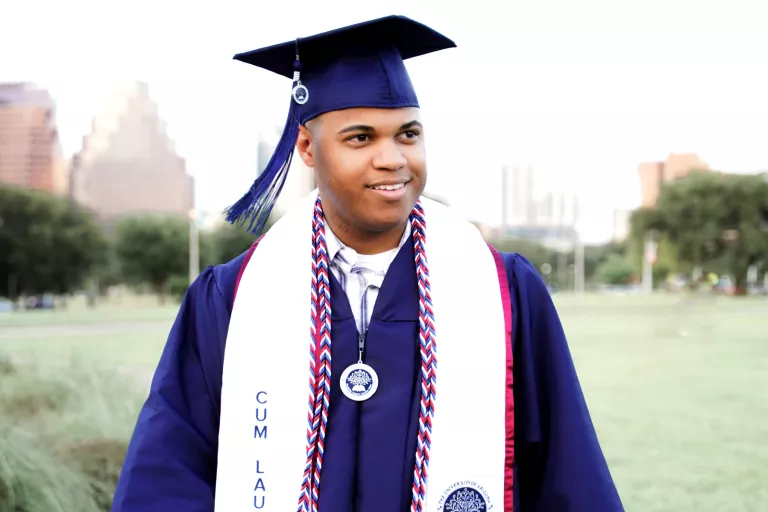 Graduate man in robes