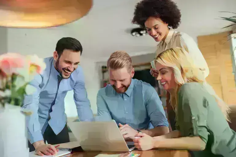 Students around a laptop