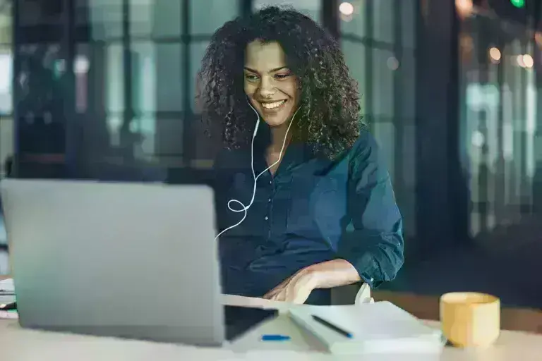 woman working using her laptop