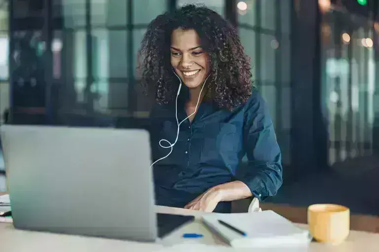 woman working using her laptop