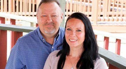Father-Daughter Duo Cross the Stage Together at Commencement